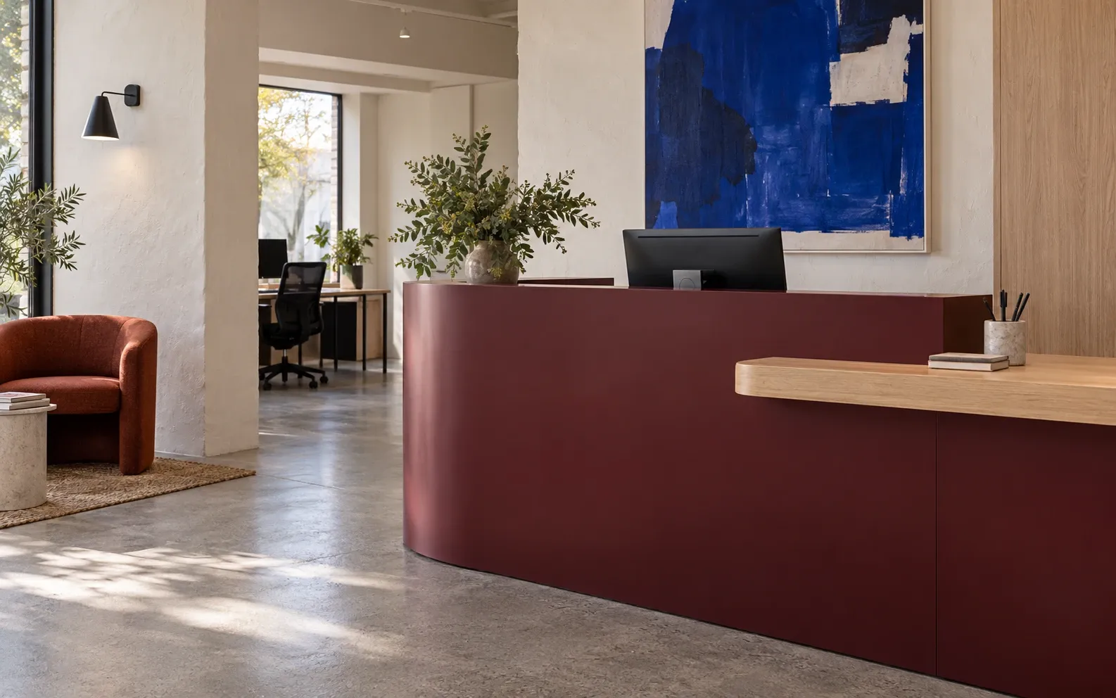AI concept of a burgundy reception counter with a pale timber-effect ledge
