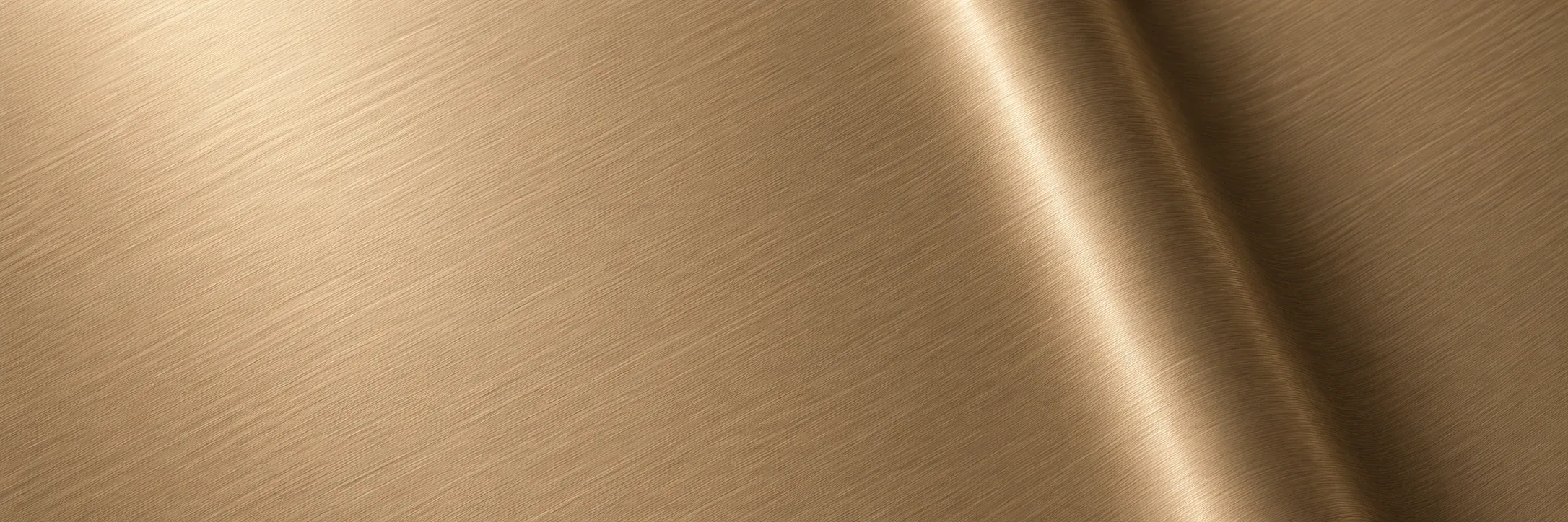 Brushed bronze-effect architectural vinyl with a straight diagonal bend